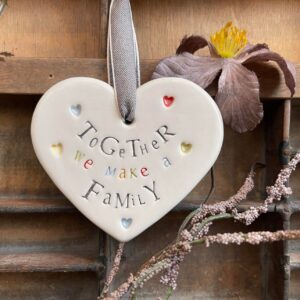 TOGETHER WE MAKE A FAMILY
